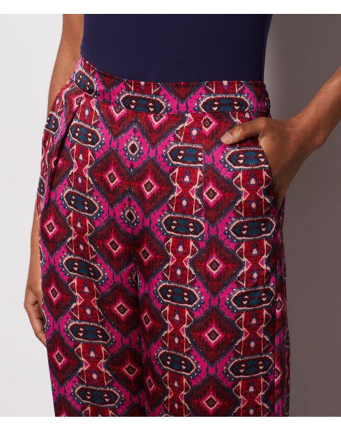 Pantalon blanca imprimé fond violet