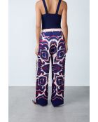 Venusbroek met roze achtergrondprint