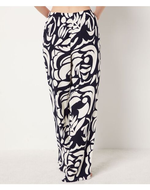 Belina broek met baksteenprint op de achtergrond