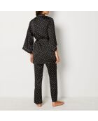 Negligé van Polkas met zwarte achtergrondafdruk