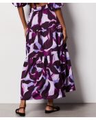 Falda Uzes estampada sobre fondo morado