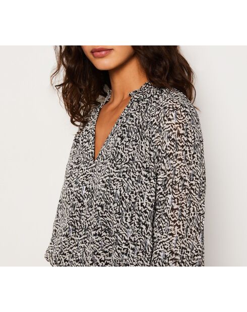 Lexie-jurk gedrukt op een zwarte achtergrond