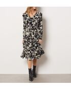 Remedios jurk gedrukt op een zwarte achtergrond