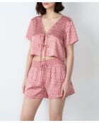 Kaila Shorts mit Backstein-Hintergrundprint