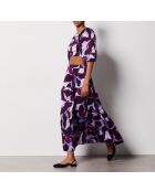 Falda Uzes estampada sobre fondo morado