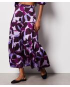 Falda Uzes estampada sobre fondo morado