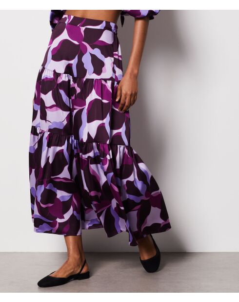 Falda Uzes estampada sobre fondo morado