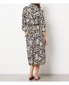 Anita jurk gedrukt op een zwarte achtergrond