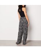 Idyle-broek gedrukt op een zwarte achtergrond