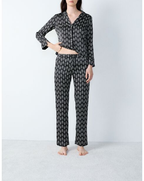 Nex broek gedrukt op zwarte achtergrond