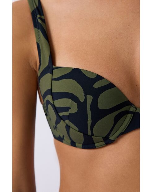 Klassieke push-up bh met beugel en schelp Pipa gedrukt op een groene achtergrond