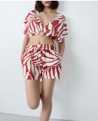 Korte broek van Kalio gedrukt op een ecru achtergrond