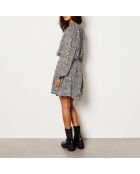 Lexie-jurk gedrukt op een zwarte achtergrond