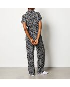 Aidyle Jumpsuit gedruckt auf schwarzem Hintergrund