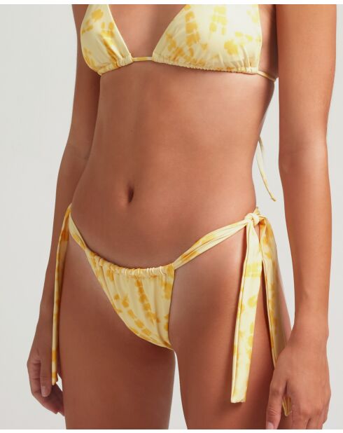 Al Sole slips gedrukt op een ecru achtergrond