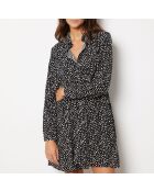 Reglissi-jurk gedrukt op een zwarte achtergrond