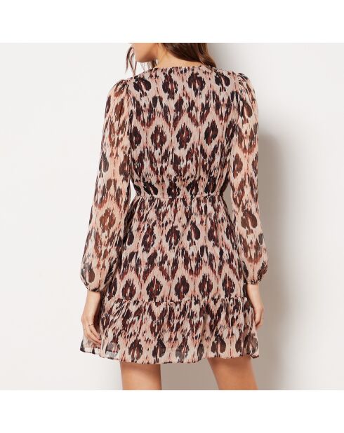 Een lila blauwgroene jurk met print