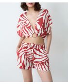 Korte broek van Kalio gedrukt op een ecru achtergrond