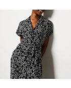 Aidyle Jumpsuit gedruckt auf schwarzem Hintergrund