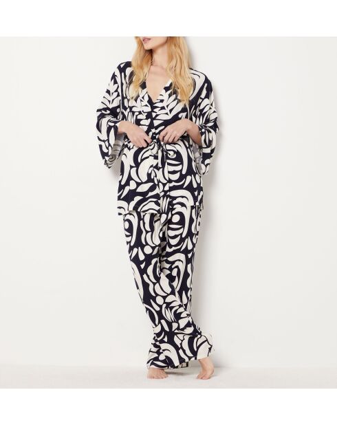 Belina broek met baksteenprint op de achtergrond