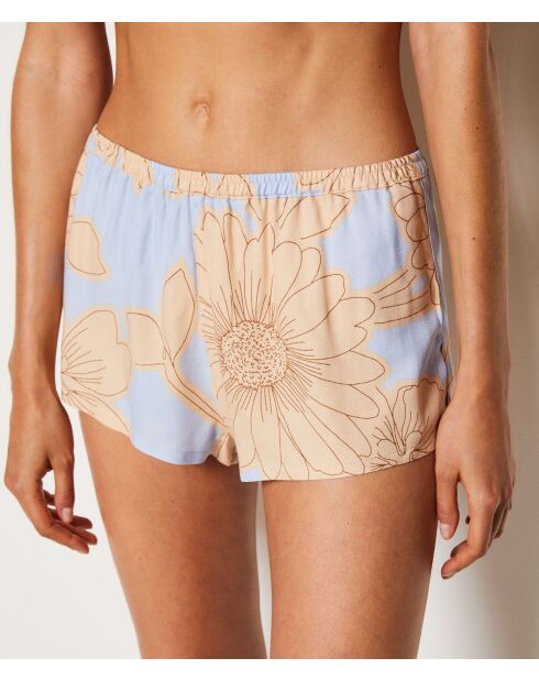 Magnolia-short met paarse achtergrondprint