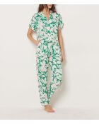 Pantaloni Vyns stampati su sfondo verde