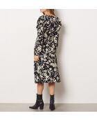 Remedios jurk gedrukt op een zwarte achtergrond