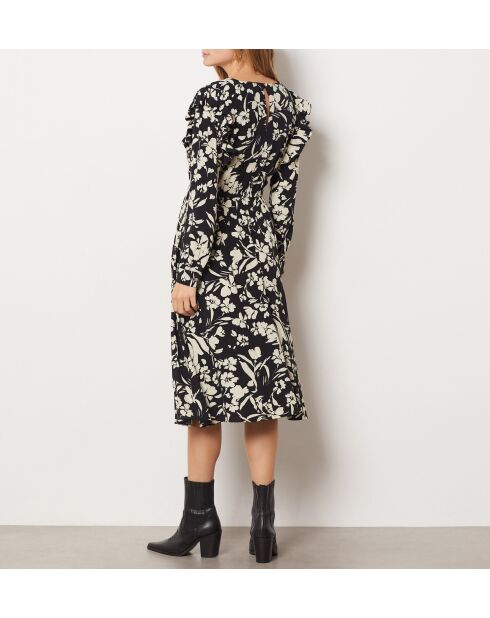 Remedios jurk gedrukt op een zwarte achtergrond