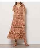 Abito Vogeli con sfondo mattone