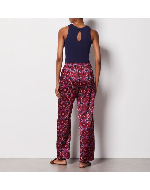 Pantalon blanca imprimé fond violet