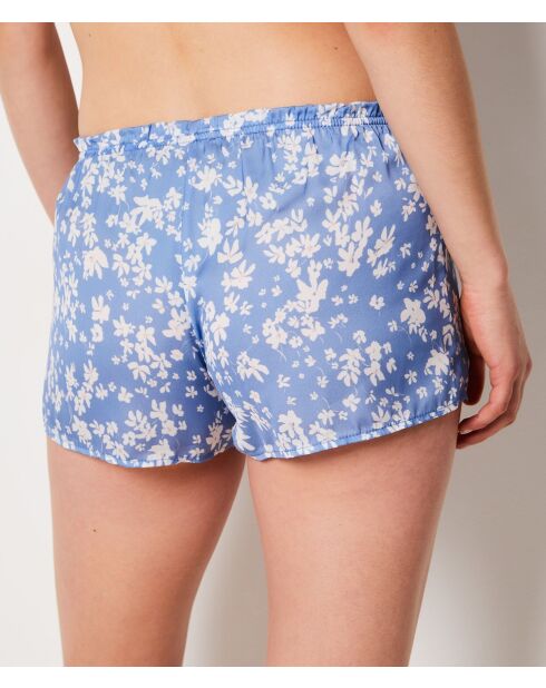 Lavendelkleurige short met paarse achtergrondprint