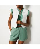 Ecru jasje met geborduurde Charlotte