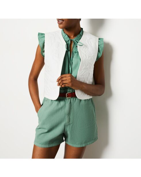 Ecru jasje met geborduurde Charlotte