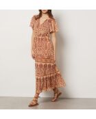 Abito Vogeli con sfondo mattone