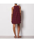 Vestido Bello estampado sobre fondo morado