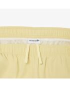 Bañador largo con marca amarilla/calathea