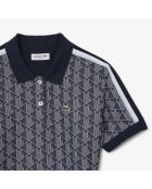 Marineblauw/witte jacquard-polojurk met jacquardmonogram en slanke pasvorm