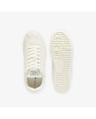 Cremefarbene Sneakers Baseshot aus Veloursleder