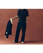 Marineblauwe polotrui van zwaar katoen met korte mouwen