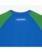 Gypsian/Calathea-marineblauw Ultra Dry tennist-shirt met kleurvlakken