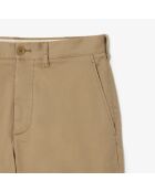 Schmal zulaufende Chinohose aus Stretchbaumwolle mit Löwe