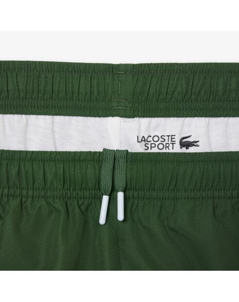 Pantalones deportivos de marca verde
