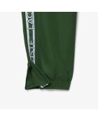 Pantalones deportivos de marca verde