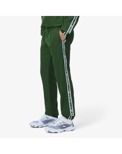Pantalones deportivos de marca verde