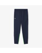 Sportjoggingbroek met kleurvlakken marineblauw/wit-calathea