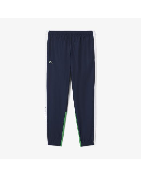Sportjoggingbroek met kleurvlakken marineblauw/wit-calathea