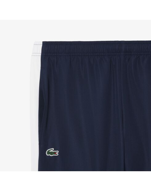 Sportjoggingbroek met kleurvlakken marineblauw/wit-calathea