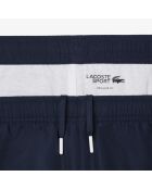 Sportjoggingbroek met kleurvlakken marineblauw/wit-calathea