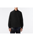 Sovracamicia nera idrorepellente