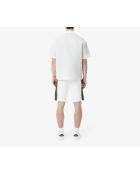 Weiße/liamone-grüne Baumwollfleeceshorts mit Farbblockmuster